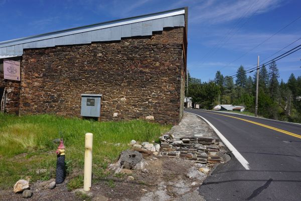 [Picture of Gamble Building side and sidewalk]